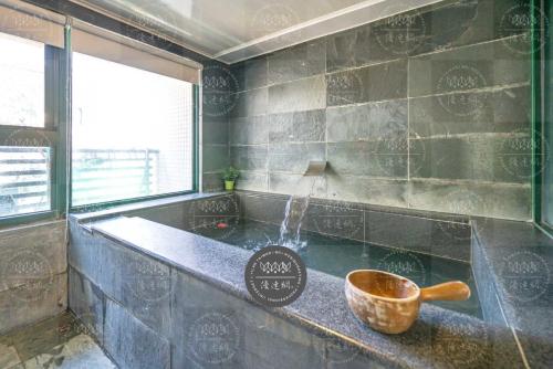 Imagen de la habitación del Hotel 礁溪溜溜溫泉民宿. Foto 12