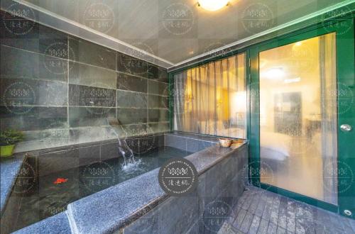 Imagen de la habitación del Hotel 礁溪溜溜溫泉民宿. Foto 14