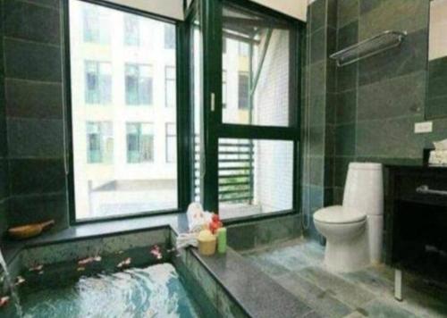 Imagen de la habitación del Hotel 礁溪溜溜溫泉民宿. Foto 15