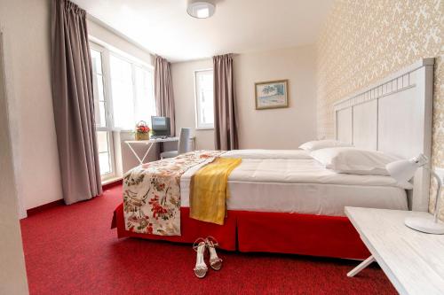 Imagen de la habitación del Hotel Хотел Глемпинг Алианс. Foto 18