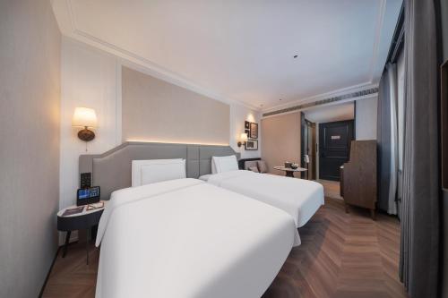 Imagen de la habitación del Hotel 南京钟山风景区逸扉酒店. Foto 12