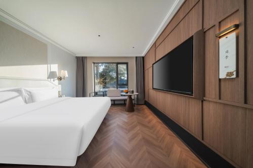 Imagen de la habitación del Hotel 南京钟山风景区逸扉酒店. Foto 13