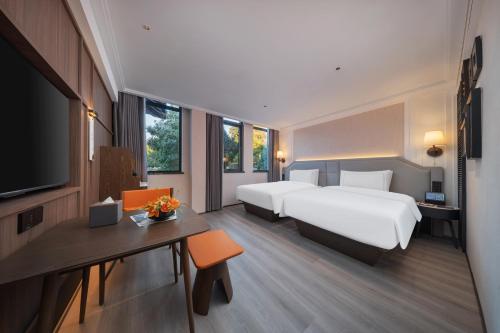 Imagen de la habitación del Hotel 南京钟山风景区逸扉酒店. Foto 16