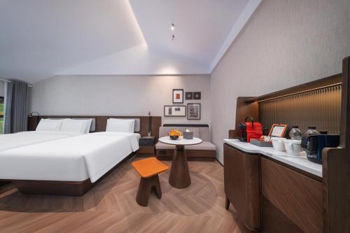 Imagen de la habitación del Hotel 南京钟山风景区逸扉酒店. Foto 17