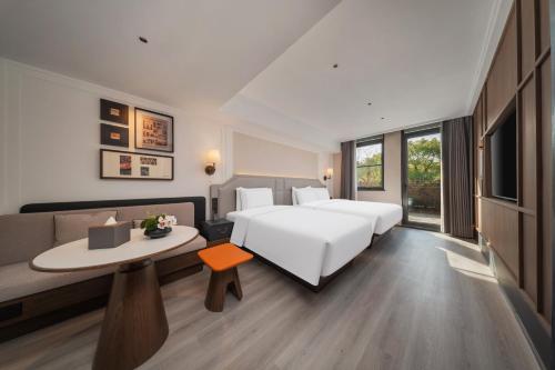 Imagen de la habitación del Hotel 南京钟山风景区逸扉酒店. Foto 18