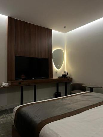 Imagen de la habitación del Hotel سيفن سون للأجنحة الفندقية. Foto 19