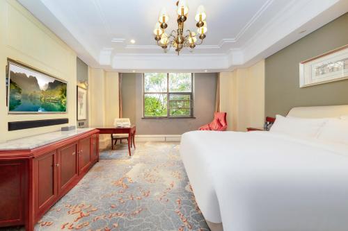 Imagen de la habitación del Hotel 常德华尔夫酒店. Foto 17