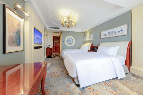 Imagen de la habitación del Hotel 常德华尔夫酒店. Foto 18