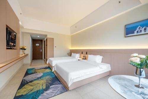 Imagen de la habitación del Hotel 海陵岛瑞璟大酒店. Foto 17