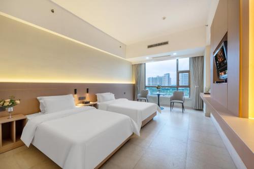 Imagen de la habitación del Hotel 海陵岛瑞璟大酒店. Foto 18