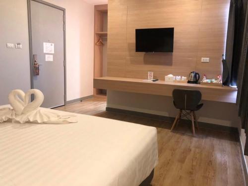 Imagen de la habitación del Hotel โรงแรม เดอะโมเดล การ์เด้น. Foto 18