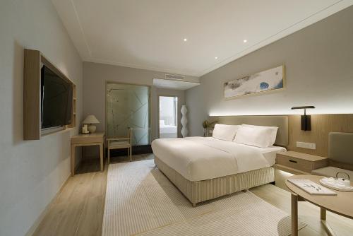 Imagen de la habitación del Hotel 凯瑞汀酒店 重庆西站巴国城店. Foto 19