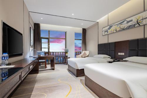 Imagen de la habitación del Hotel 宜昌虹桥国际大酒店. Foto 14