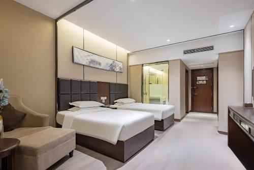 Imagen de la habitación del Hotel 宜昌虹桥国际大酒店. Foto 19