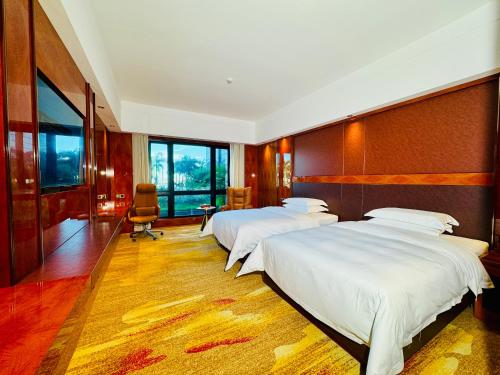 Imagen de la habitación del Hotel 珠海毛林金湾大酒店. Foto 11