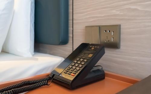 Imagen de la habitación del Hotel 昊丽贵阳喷水池地铁站酒店. Foto 15