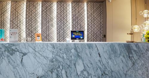 Imagen general del Hotel 昊丽贵阳喷水池地铁站酒店. Foto 8