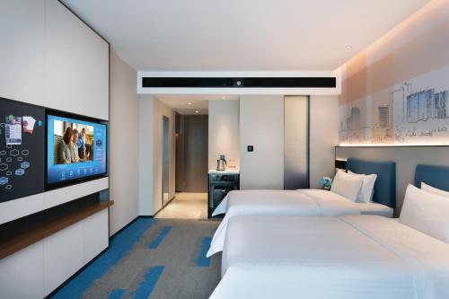 Imagen de la habitación del Hotel 南宁安吉希尔顿欢朋酒店. Foto 20