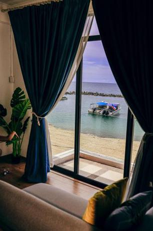 Imagen de la habitación del Hotel 沙巴海豚岛酒店. Foto 19