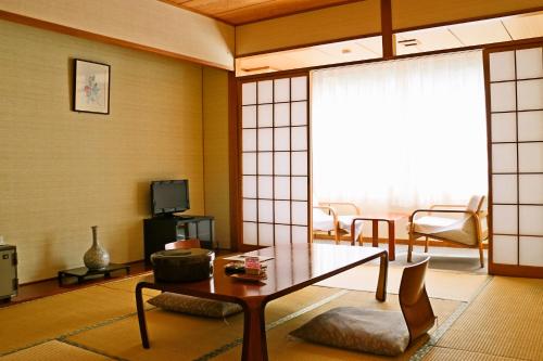 Imagen de la habitación del Hotel 竹あかりの宿 加賀助. Foto 9