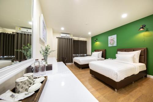 Imagen de la habitación del Hotel โรงแรมต้นเงิน. Foto 8