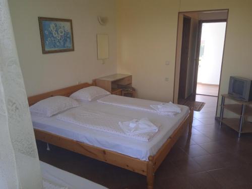 Imagen de la habitación del Hotel Стаи за гости Нептун. Foto 18