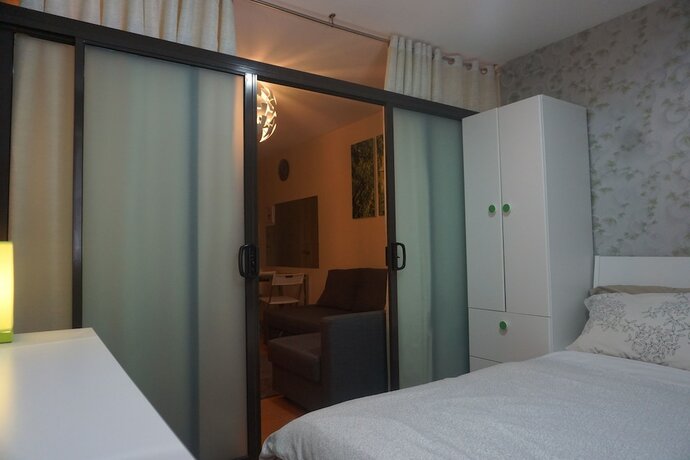 Imagen general del Hotel 1 Bedroom Deluxe Condo At Apartelle D' Oasis. Foto 11