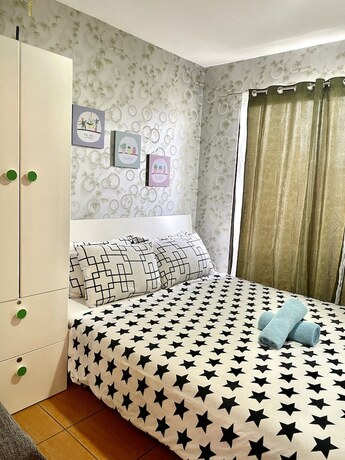Imagen general del Hotel 1 Bedroom Deluxe Condo At Apartelle D' Oasis. Foto 12