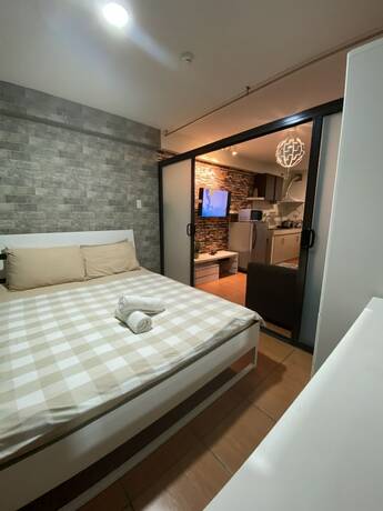 Imagen general del Hotel 1 Bedroom Deluxe Condo At Apartelle D' Oasis. Foto 14