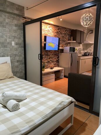 Imagen general del Hotel 1 Bedroom Deluxe Condo At Apartelle D' Oasis. Foto 16