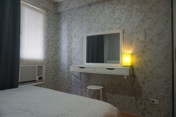 Imagen de la habitación del Hotel 1 Bedroom Deluxe Condo At Apartelle D' Oasis. Foto 24