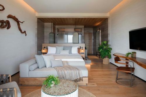Imagen de la habitación del Hotel 1 Haitang Bay Sanya. Foto 5