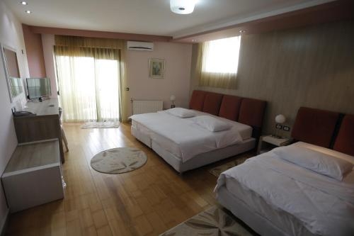 Imagen de la habitación del Hotel 1 Maji. Foto 7