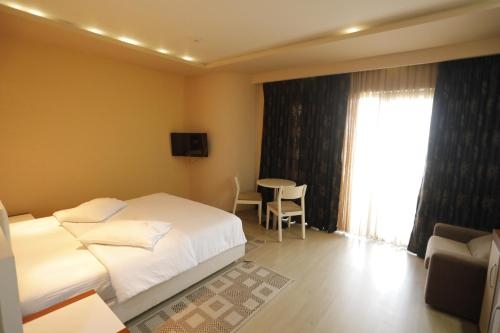 Imagen de la habitación del Hotel 1 Maji. Foto 10