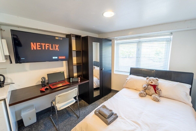 Imagen de la habitación del Hotel 100 Dale Road Studios in Guest House. Foto 15