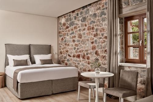 Imagen de la habitación del Hotel 100 Rizes Seaside Resort. Foto 6