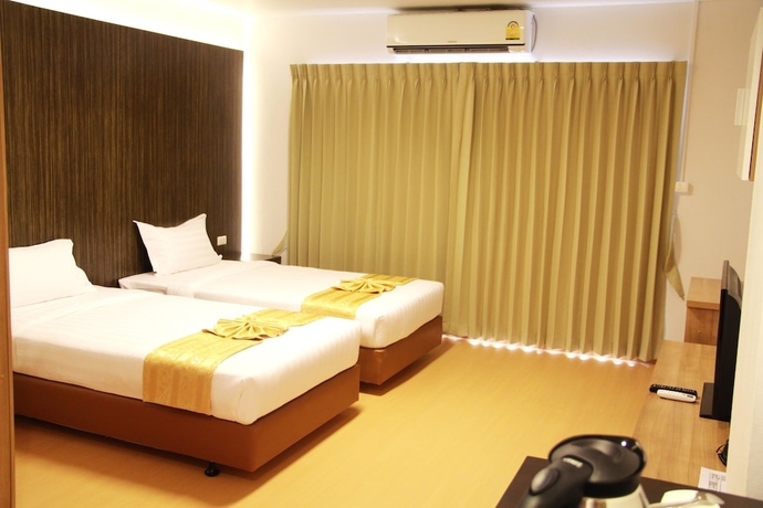 Imagen de la habitación del Hotel 101 Holiday Suite. Foto 2