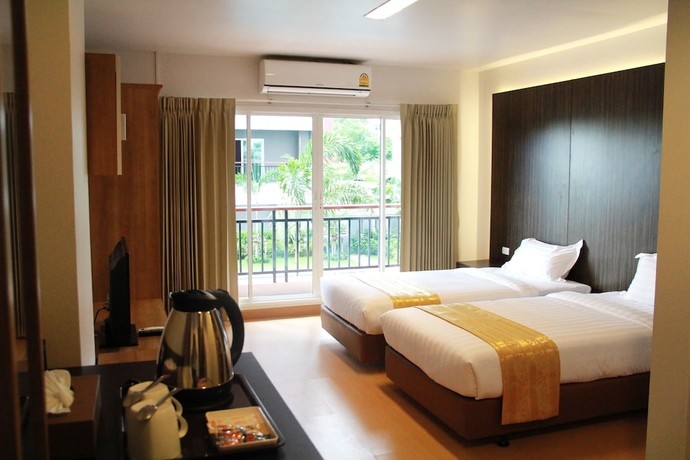 Imagen de la habitación del Hotel 101 Holiday Suite. Foto 3
