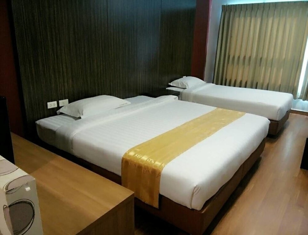 Imagen de la habitación del Hotel 101 Holiday Suite. Foto 4