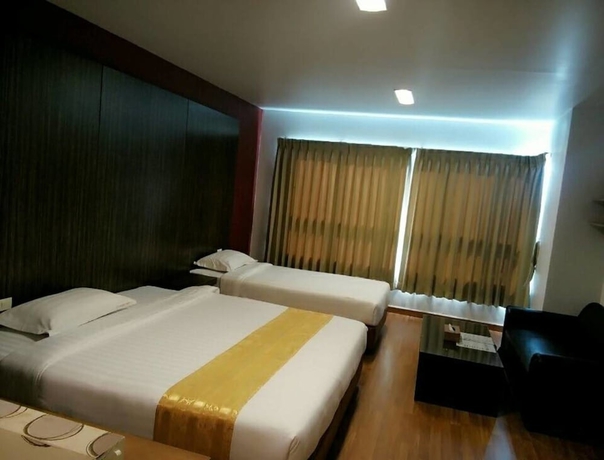 Imagen de la habitación del Hotel 101 Holiday Suite. Foto 5