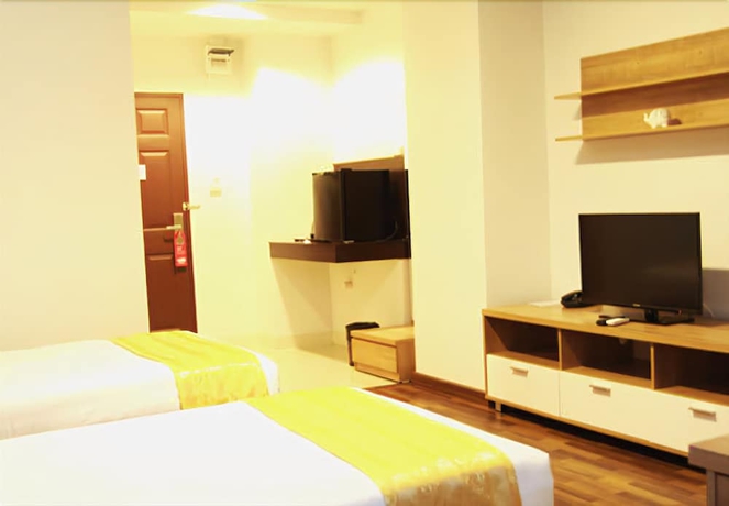 Imagen de la habitación del Hotel 101 Holiday Suite. Foto 10