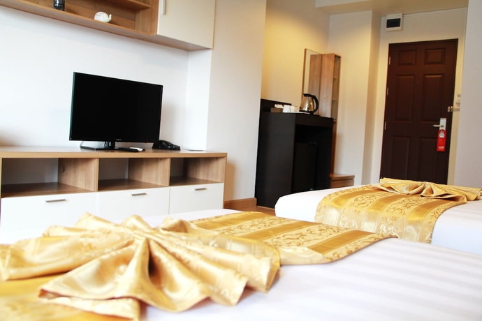 Imagen de la habitación del Hotel 101 Holiday Suite. Foto 14