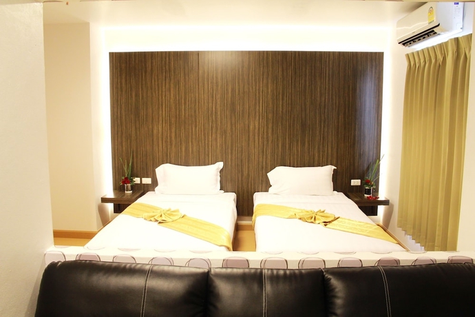Imagen de la habitación del Hotel 101 Holiday Suite. Foto 15