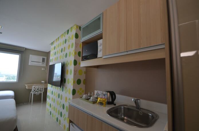 Imagen de la habitación del Hotel 101 Manila. Foto 18