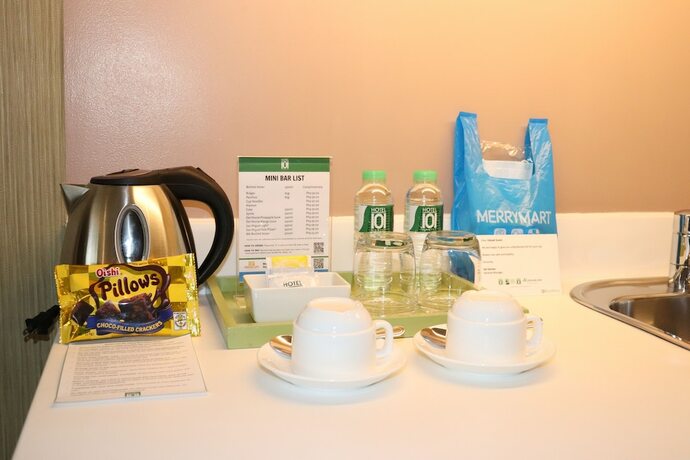 Imagen de la habitación del Hotel 101 Manila. Foto 23