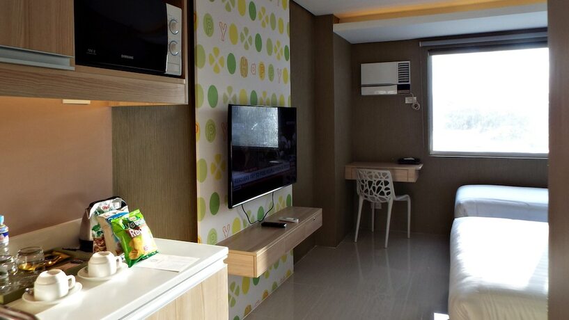 Imagen de la habitación del Hotel 101 Manila. Foto 25