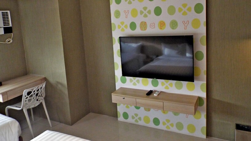 Imagen de la habitación del Hotel 101 Manila. Foto 28