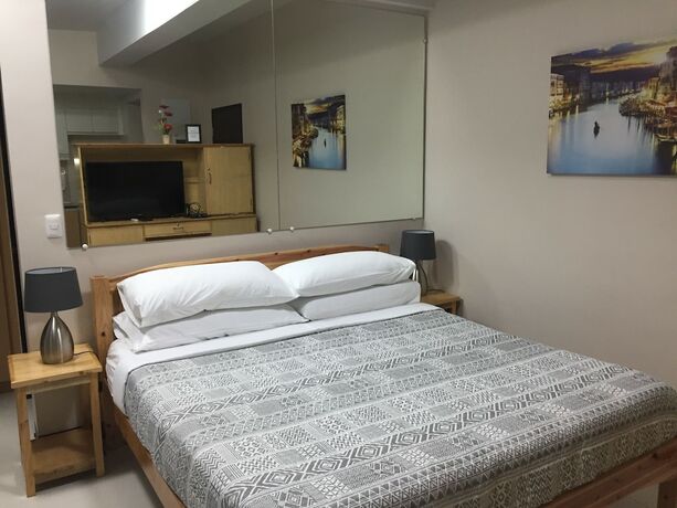 Imagen de la habitación del Hotel 101 Newport Condo Across The Airport. Foto 19