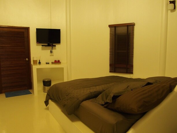 Imagen de la habitación del Hotel 102 Ville. Foto 26