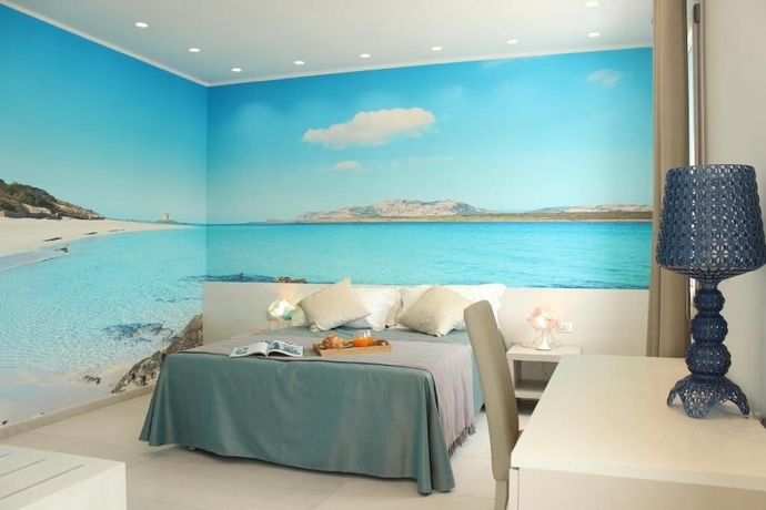 Imagen de la habitación del Hotel 103 Boutique Stintino. Foto 1